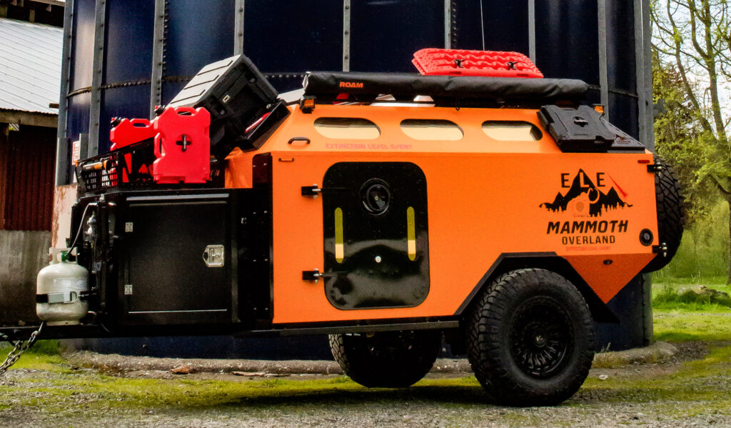 Mammoth Overland ELE off-road trailer side profile with MaxTrax recovery boards and jerry cans